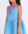 blue summer dress with a pink little bow on the front