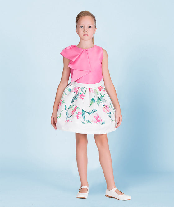 Girls' white floral skirt with green leaves and pink flower prints, perfect for spring and summer