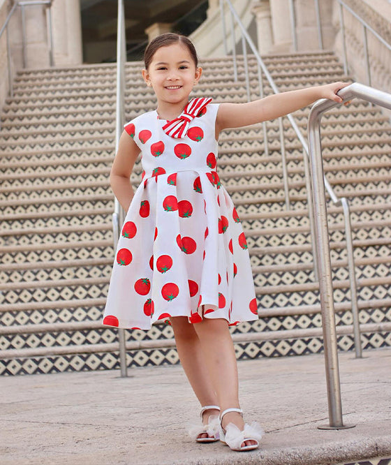 ecru tomato printed dress with a striped bow 