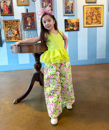  green blouse with floral pants